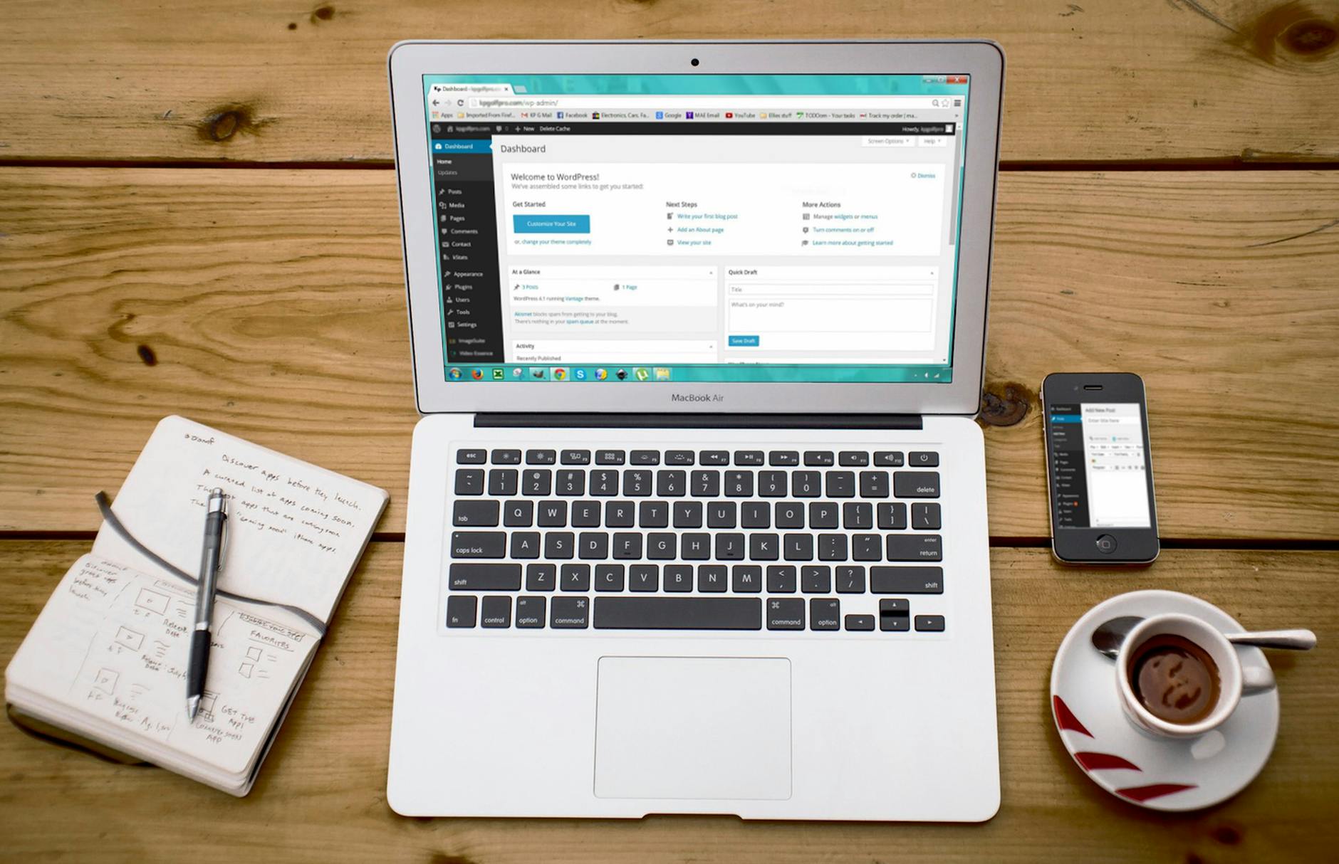 Laptop workspace for setting up a WordPress blog on cheap hosting