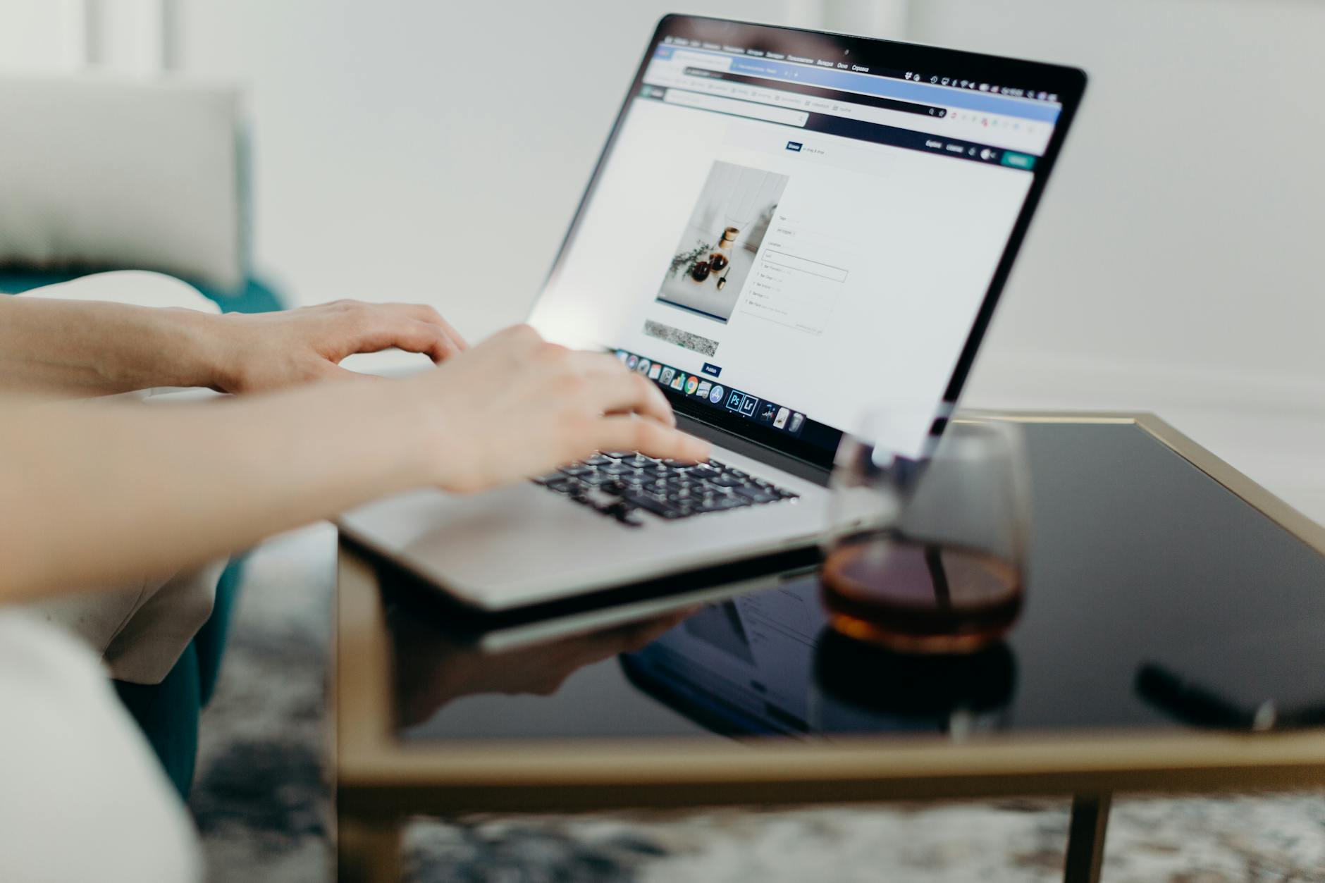 Person building a WordPress website on laptop with budget hosting