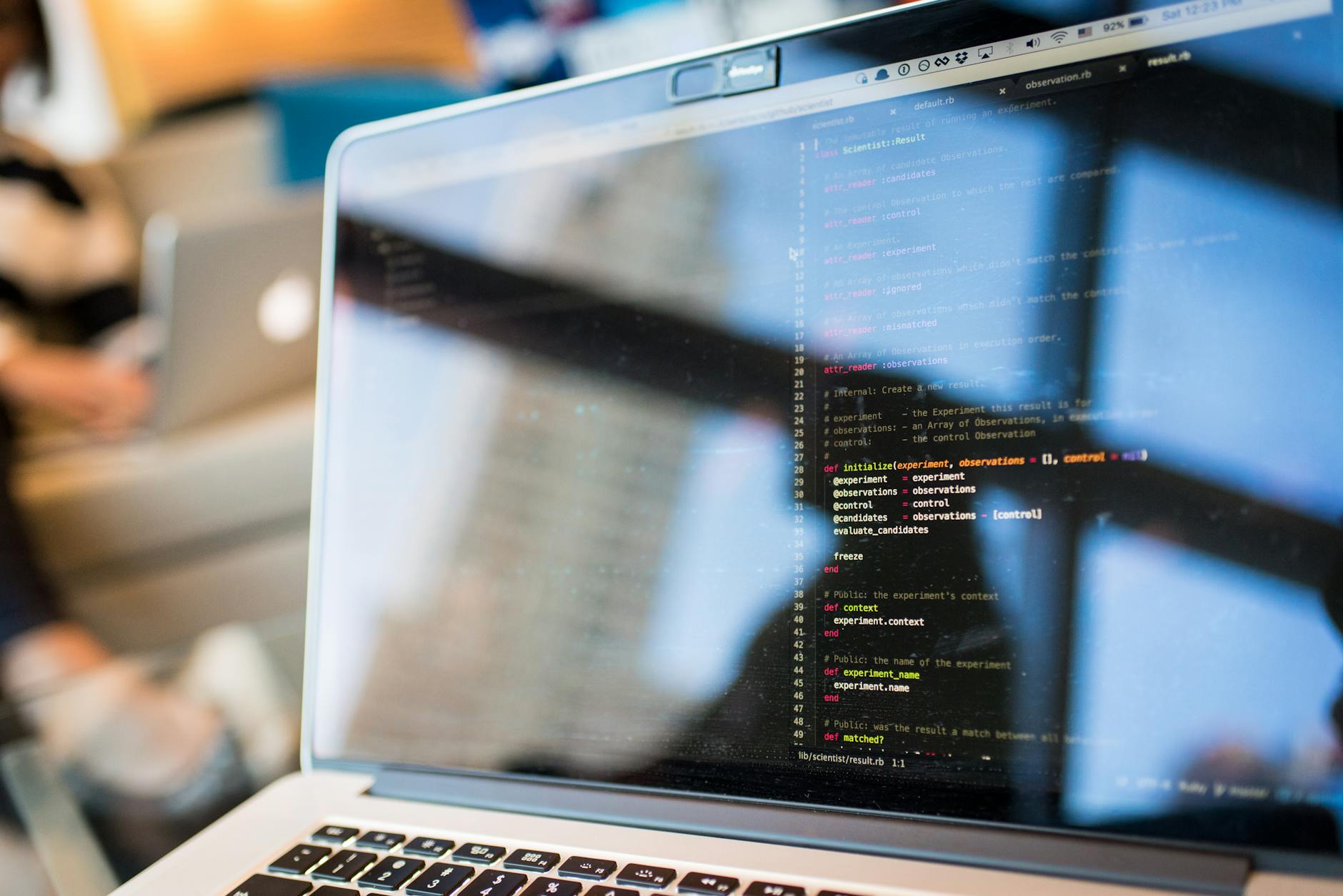 Developer working on a MacBook Pro laptop