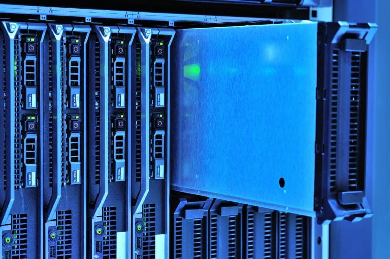 Best Web Hosting for Small Business 2026: Why hosting.com Is the Smart Choice - Detailed view of server racks with glowing li