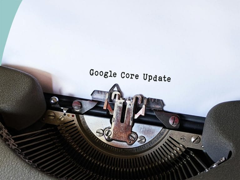 How to Migrate Your Website to a New Host (Step-by-Step Guide) - Close-up of a typewriter typing 'Google Core Update' on pape