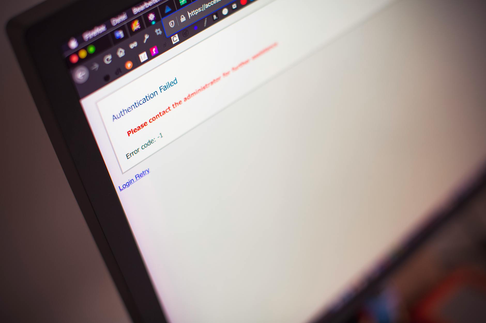 How to Secure Your Website: A Beginner's Guide (2026) - Close-up of a computer screen displaying an authentication failed mes