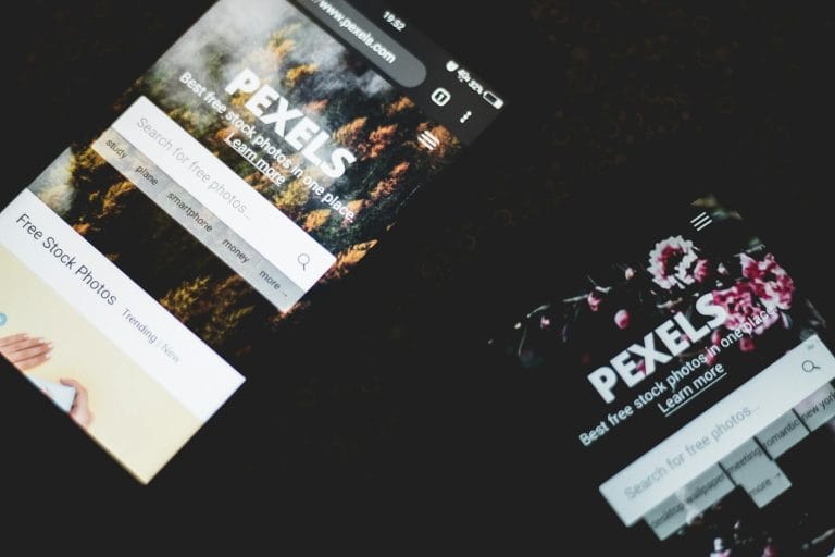 How to Speed Up Your Website with Better Hosting (7 Proven Steps) - Close-up of smartphones displaying Pexels stock photo web
