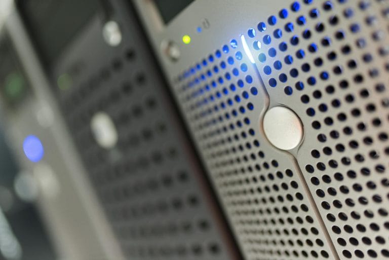 InterServer VPS Special: Get a Powerful Cloud VPS for Just $3/Month - Focused detail of a modern server rack with blue LED in