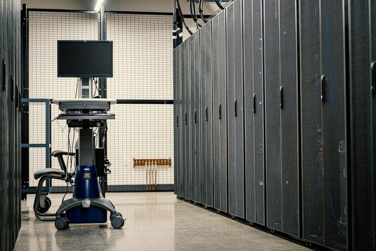 Shared Hosting vs Cloud Hosting vs VPS: Which One Do You Actually Need in 2026? - Contemporary computer on support between te